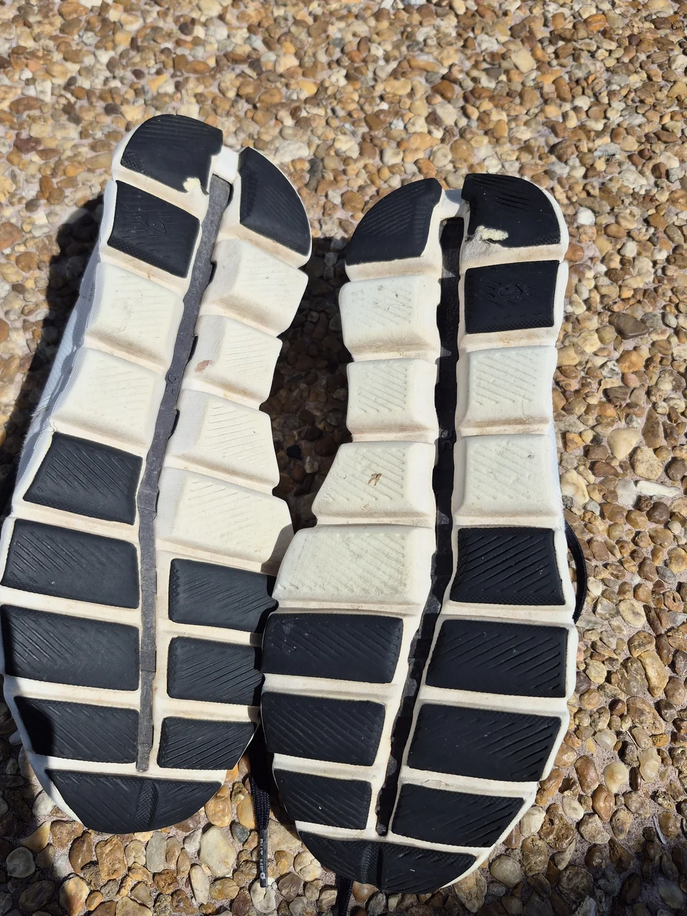 On Running Men’s Cloud Athletic Sneakers in White and Black